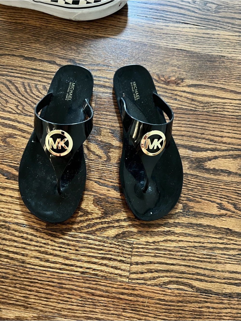 Michael Kors Black Jelly Thong Sandals with Gold MK Medallion